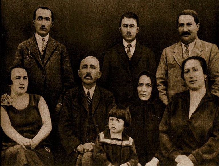 Clara Daniels (Age 4) with her aunts, uncles, and grandparents
