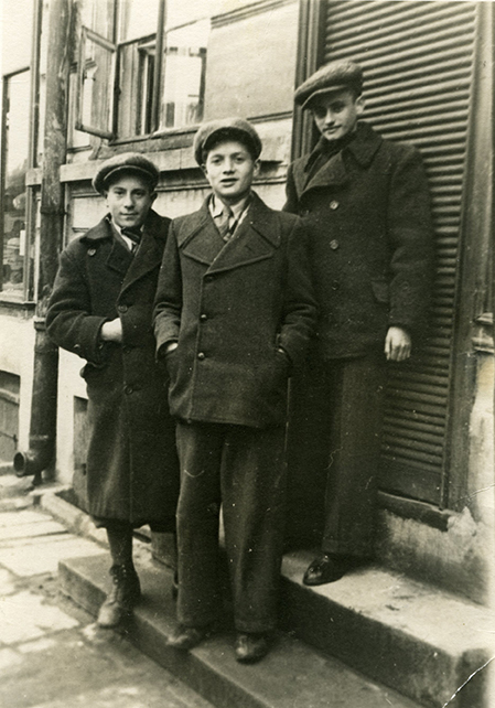 Alan (center) with two friends in 1937